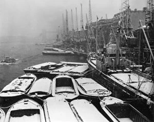 In Berth; Dutch ship Lingestroom covered in snow at Hays Wharf in the Pool of London