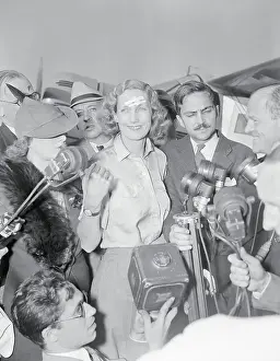 Beryl Markham Speaking into Microphones