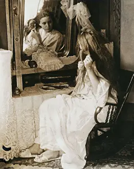 Bessie Love Brushing Hair Before Mirror