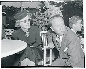 Bette Davis Chatting with Joe Pasternak
