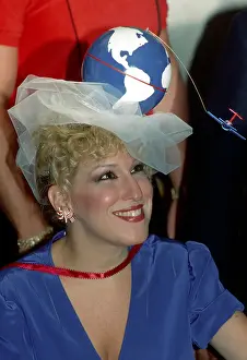 Bette Midler Attends An Event Wearing A Unique Hat