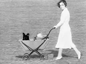 Betty Gow Pushing Baby Carriage