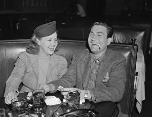 Betty Grable and Artie Shaw Sitting in Booth