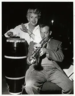 Betty Grable and Her Husband Playing Music