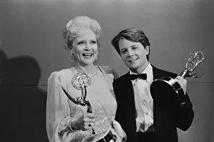 Emmy Award Ceremonies Prints: Betty White and Michael J. Fox Holding Emmy Awards