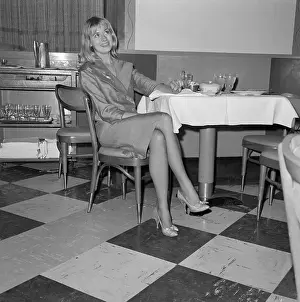 Beverly Aadland Sitting at Table