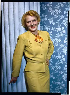 Beverly Roberts Standing Against Wall