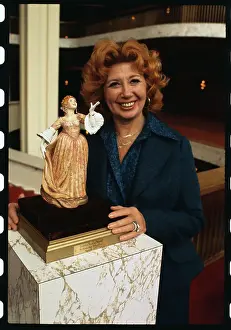 Beverly Sills Posing with Figurine
