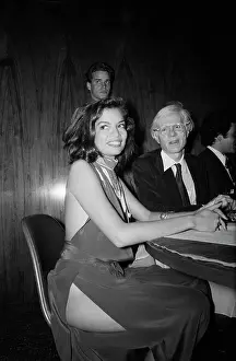 Bianca Jagger and Andy Warhol at Party