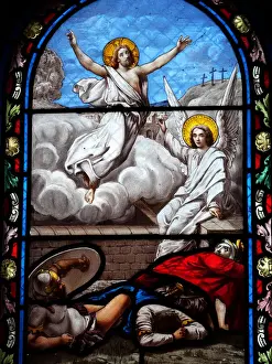 Biblical scene of the resurrected Jesus Christ on an antique stained glass window