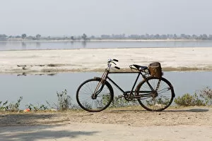 Bicycle on the banks of the Kosi or Koshi River, Terai region, Nepal, Asia