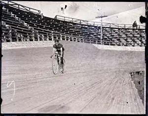 Bicycling Prints: Bicyclist Riding Bike on Track