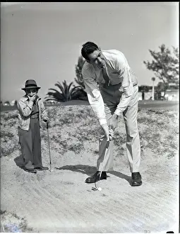 Match Prints: Big And Small Man Play Golf