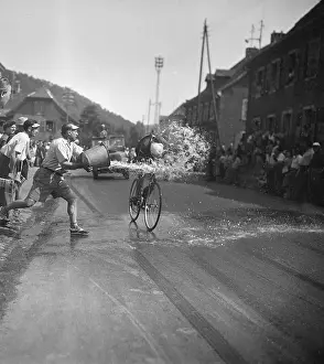 Pail Prints: Bike Rider Getting Splashed With Water