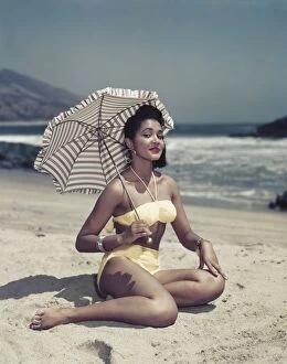Iconic Bikini Collection: Bikini Beach Model with an Umbrella