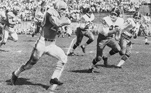 Sprinting Prints: Billy Cannon Rushing Against the Titans