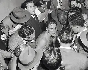 Billy Conn Surrounded by Waiters