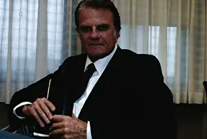 Billy Graham Holding Bible