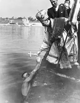 Swimmer Prints: Bishop Receiving Cross From Swimmer
