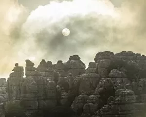 Images Dated 24th April 2013: Bizarre limestone rock formations with the sun and fog, El Torcal Nature Reserve, Antequera