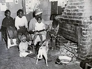 Grandmother Prints: Black Family in Front of Fireplace