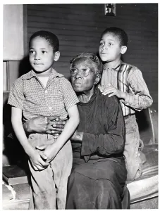 Grandchildren Prints: Black Grandmother With Two Grandchildren
