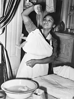 Weighing Prints: Black Nurse Weighing Baby