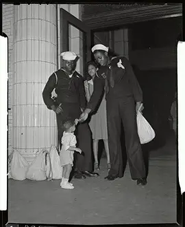 Giving Prints: Black Sailor Gives Boy Souvenir