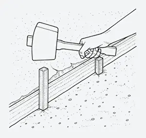 Mallet Prints: Black and white illustration of hand holding mallet above wooden edging post in ground
