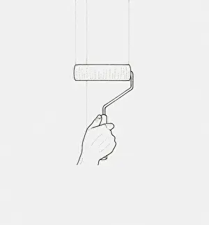Applying Prints: Black and white illustration of hand holding paint roller against wall