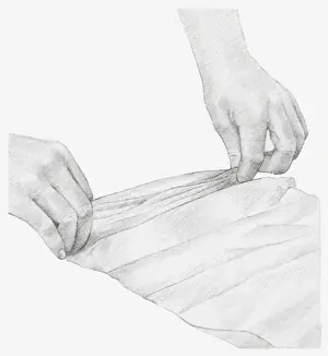 Storing Prints: Black and white illustration of hands pleating a strip of tissue paper