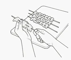 Five Objects Prints: Black and white illustration of putting filleted fish on skewers