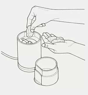 Black and white illustration of putting nut in grinder
