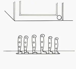 Handle Prints: Black and white illustration of row of kitchen knife handles in a slot cut into the worktop