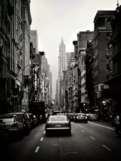 Iconic Woolworth Building Collection: Black and white image of a vintage car in Broadway