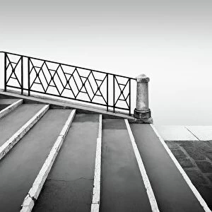 Ronny Behnert Collection: Black and white photograph of a bridge railing in the fog at the Fondamenta Nuove in the north of