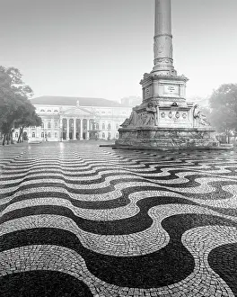 Uninhabited Prints: Black and white photograph of the Praca Dom Pedro with the famous wave pattern in Lisbon