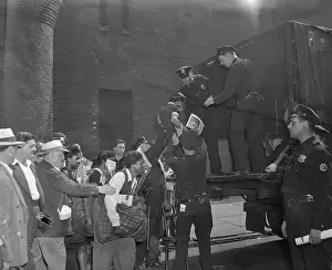 Rioter Prints: Black Woman Being Helped into Truck by Police