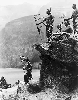 Native Am Prints: Blackfeet Warriors Standing On Rock Croppings