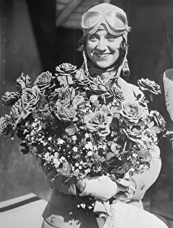 Blanche Noyes Holding a Bouquet of Flowers