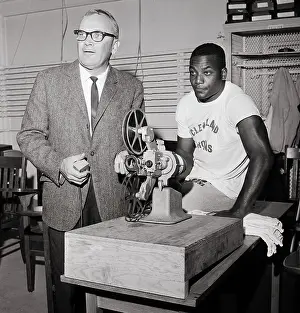 Running Back Prints: Blanton Collier and Jim Brown Watch Movie