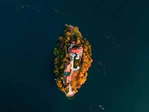 Images Dated 31st October 2018: Bled Lake with Pilgrimage Church of the Assumption of Maria at sunrise. Aerial view