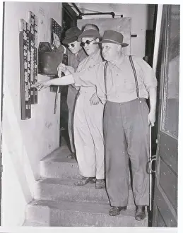 Blind Factory Workers Punching Time Cards