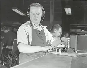 Blind Worker Testing Electronic Device