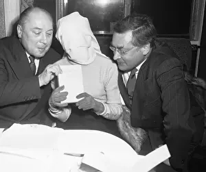 A Blindfolded Pauline Reage Receiving an Award