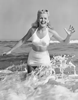 Blonde woman in two piece bathing suit