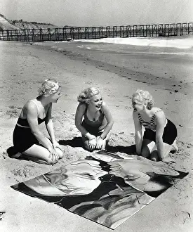 Puzzle Prints: Three Blonde Women on Beach with Puzzle