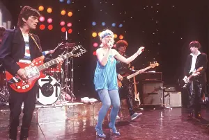 Prints of LOS ANGELES - JANUARY 19: Debbie Harry (with Nigel Harrison and Chris Stein) of the New wave group Blondie performs Heart of Glass on the TV show Midnight Special that aired on January 19 A Rare Collection of Striking Prints Capturing the Essence of Blondie: Blondie On Midnight Special