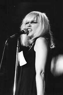 Prints of LOS ANGELES - CIRCA 1979: Singer Debbie Harry of the New Wave pop band Blondie performs onstage in circa 1979 in Los Angeles, California. (Photo by Richard Creamer/Michael Ochs Archives/Getty Images) A Rare Collection of Striking Prints Capturing the Essence of Blondie: Blondie Performing In LA