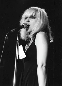 Prints of LOS ANGELES - CIRCA 1979: Singer Debbie Harry of the New Wave pop band Blondie performs onstage in circa 1979 in Los Angeles, California. (Photo by Richard Creamer/Michael Ochs Archives/Getty Images) A Rare Collection of Striking Prints Capturing the Essence of Blondie: Blondie Performing In LA
